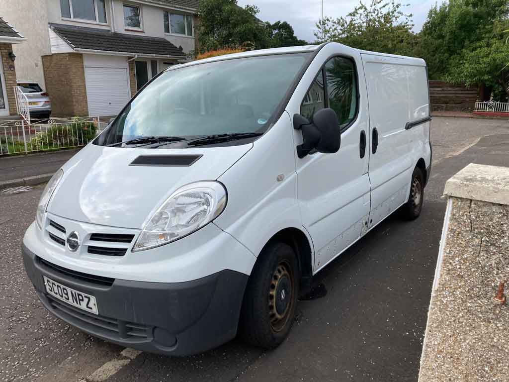 cleaned and polished van with wrapped vinyl and glue removed waiting to be picked up